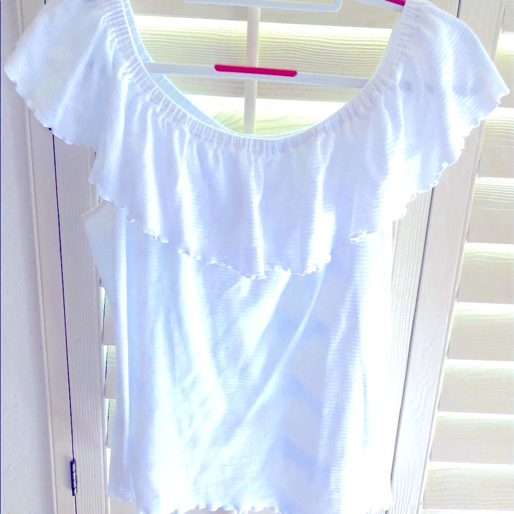Off the shoulder, ruffle top; light white cotton.